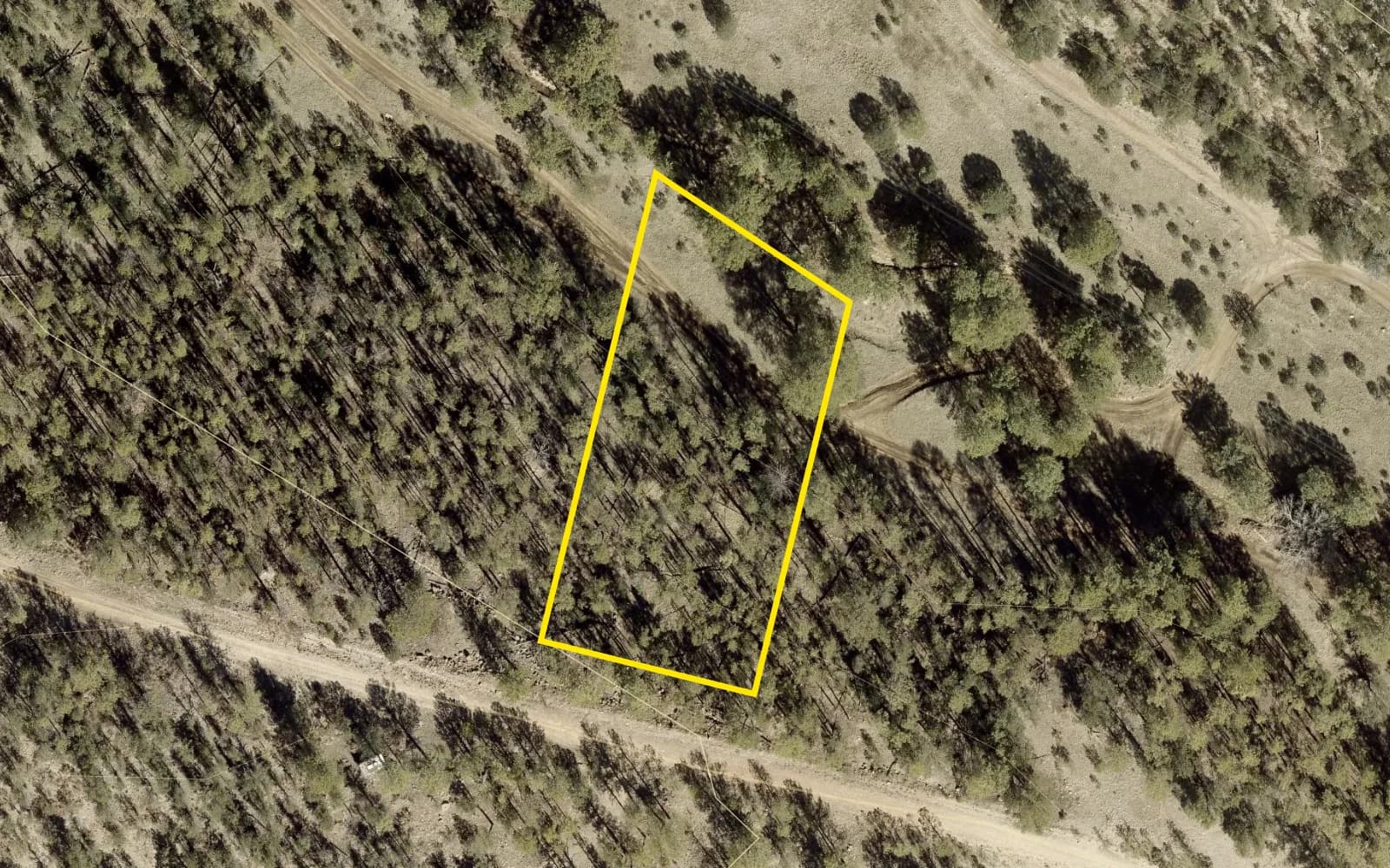 County 2026 aerial with the lot outlined in yellow