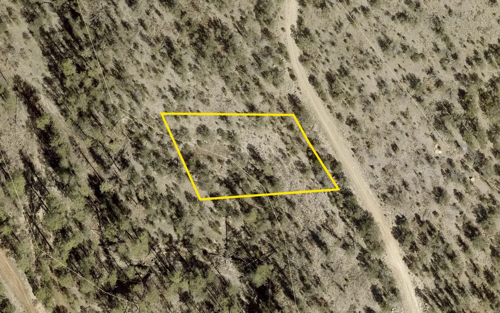 County 2026 aerial with the lot outlined in yellow