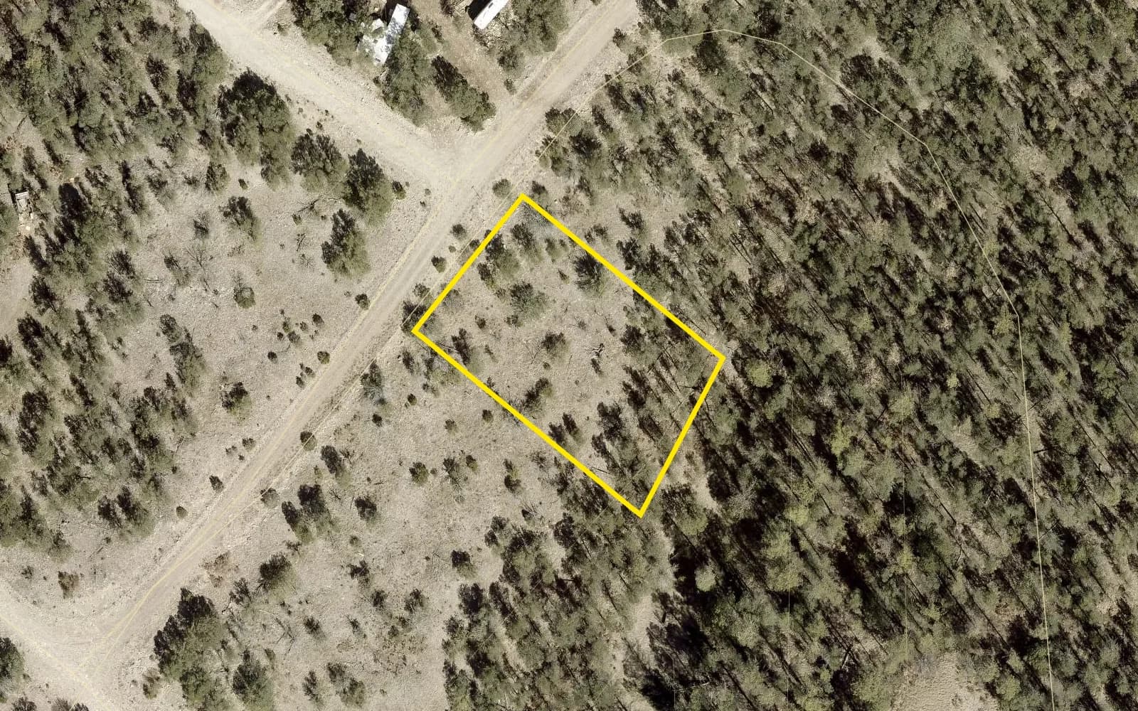 County 2026 aerial with the lot outlined in yellow